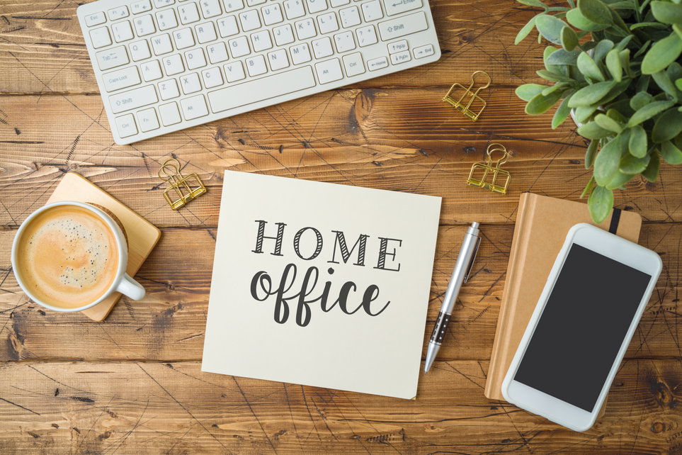 Desk with work equipment and the words Home Office Desk with work equipment and the words Home Office
